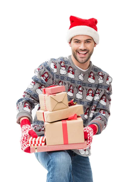 Hombre sosteniendo pila de regalos de Navidad — Foto de Stock