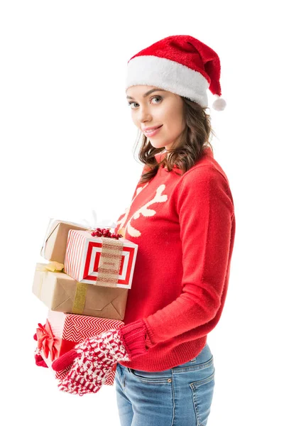 Woman holding stack of christmas gifts — Free Stock Photo