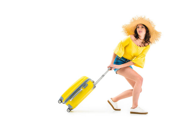 woman pulling luggage