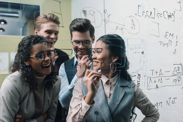 Smiling Multiethnic Businesspeople Working Glass Board Office — Free Stock Photo