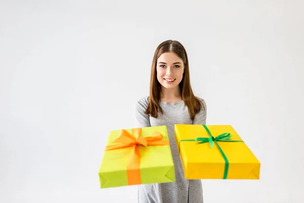 Portrait Smiling Young Woman Showing Presents Hands Isolated White — Stock Photo, Image