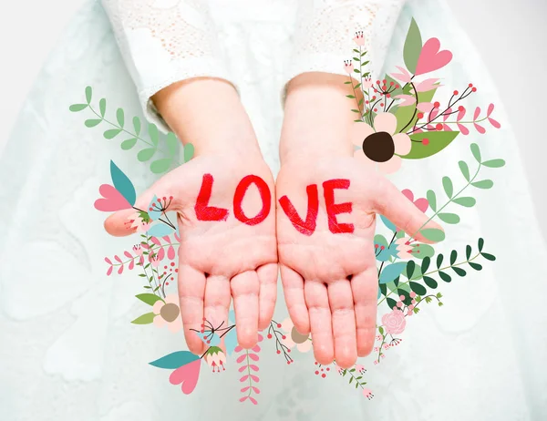 Word love written on palms — Stock Photo, Image