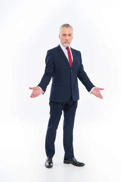 Confused mature businessman — Stock Photo