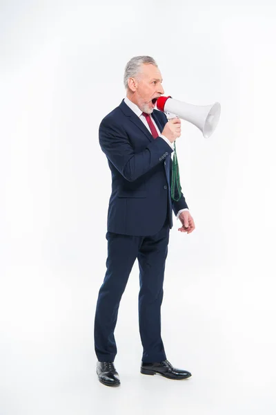 Businessman shouting in loudspeaker — Stock Photo