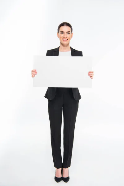 Businesswoman holding blank card — Stock Photo