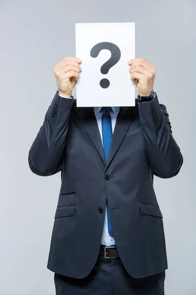 Man holding card with question mark — Stock Photo