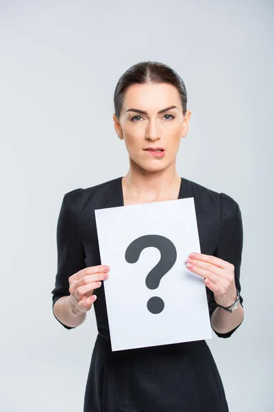 Woman holding card with question mark — Stock Photo