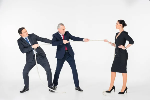 Businesspeople pulling rope — Stock Photo