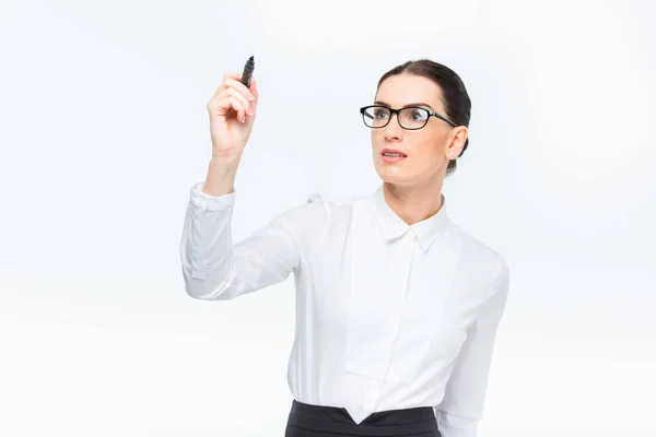 Businesswoman writing with marker — Stock Photo