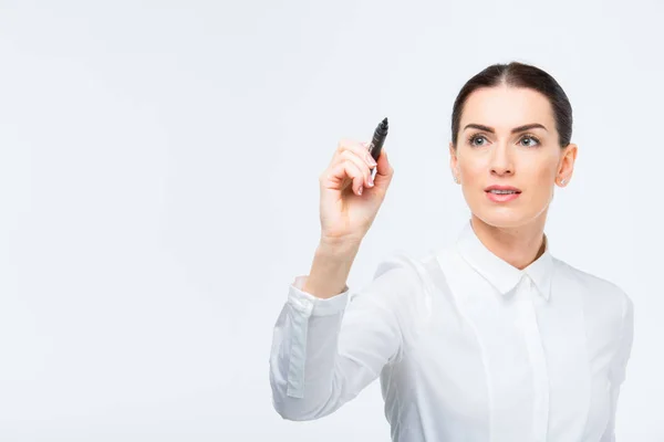 Businesswoman writing with marker — Stock Photo