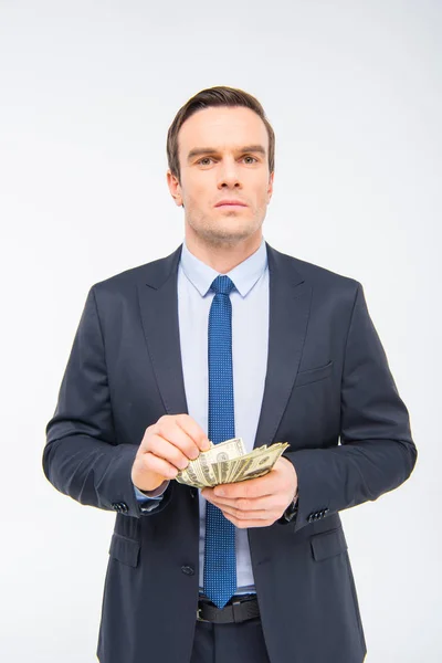 Young businessman with money — Stock Photo