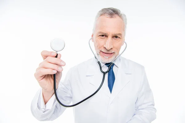 Mature doctor with stethoscope — Stock Photo