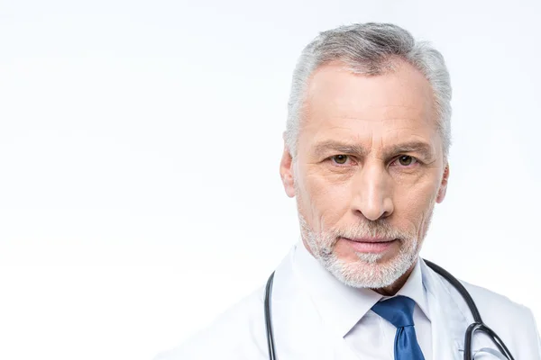 Mature doctor with stethoscope — Stock Photo