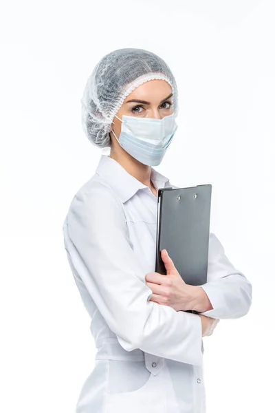 Doctor holding clipboard — Stock Photo