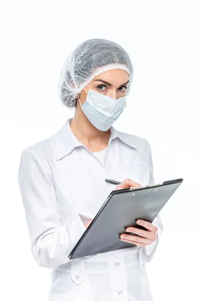 Doctor holding clipboard — Stock Photo