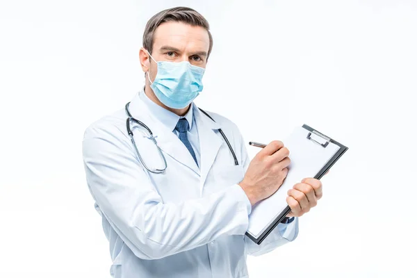 Doctor holding clipboard — Stock Photo