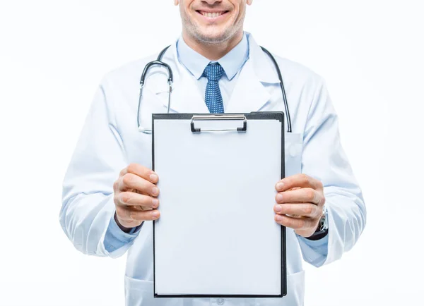 Doctor holding clipboard — Stock Photo