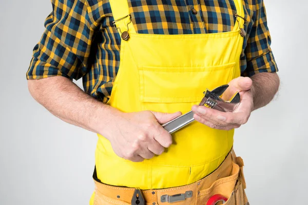 Workman with tool belt — Stock Photo