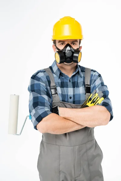 Workman with paint roller — Stock Photo