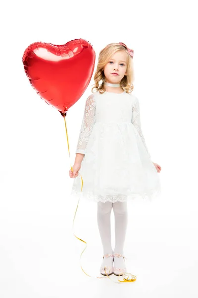 Girl with heart shaped balloon — Stock Photo