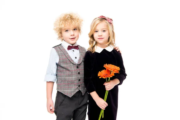 Beaux enfants avec des fleurs — Photo de stock