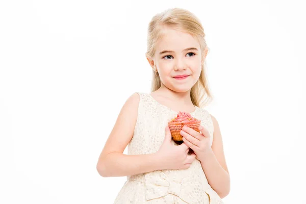 Menina segurando cupcake — Fotografia de Stock