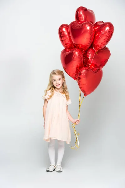 Chica con globos de aire - foto de stock