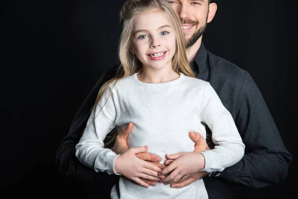 Niña con su padre - foto de stock