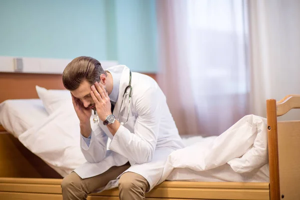 Stressed male doctor — Stock Photo