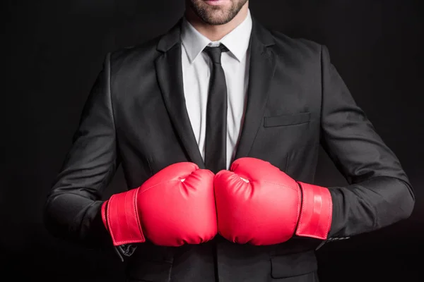 Homme d'affaires en gants de boxe — Photo de stock