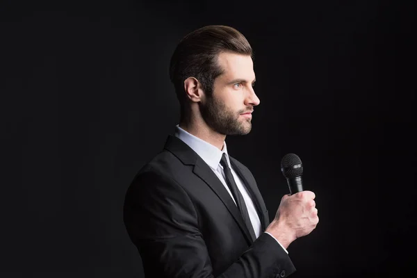 Jeune homme avec microphone — Photo de stock