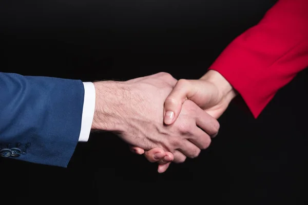 Man and woman shaking hands — Stock Photo