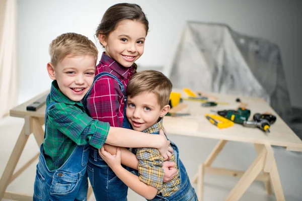Happy kids hugging — Stock Photo