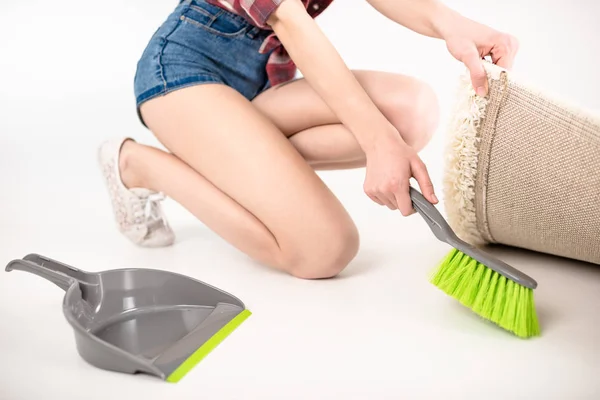 Woman with scoop and brush — Stock Photo