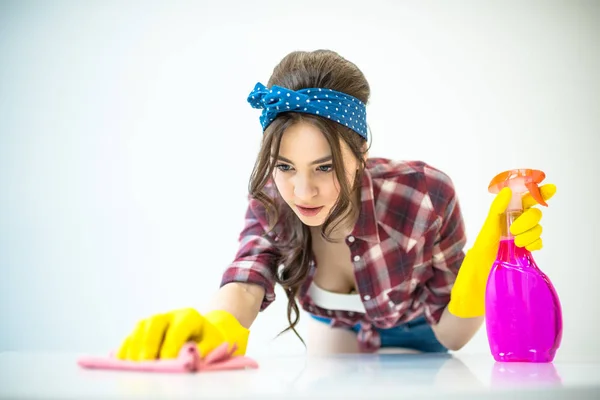 Woman cleaning surface — Stock Photo