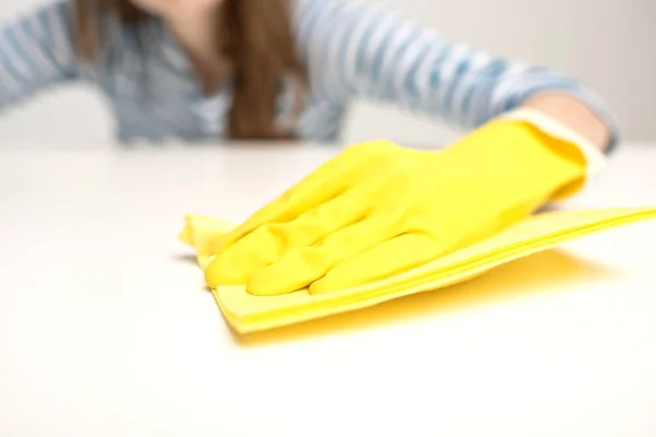 Woman cleaning surface — Stock Photo