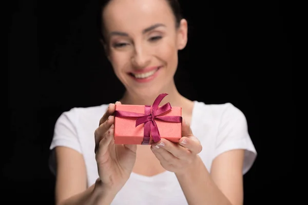 Woman holding gift — Stock Photo