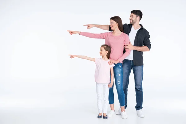 Família feliz apontando — Fotografia de Stock