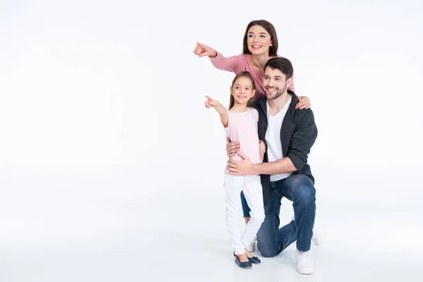 Happy family pointing — Stock Photo