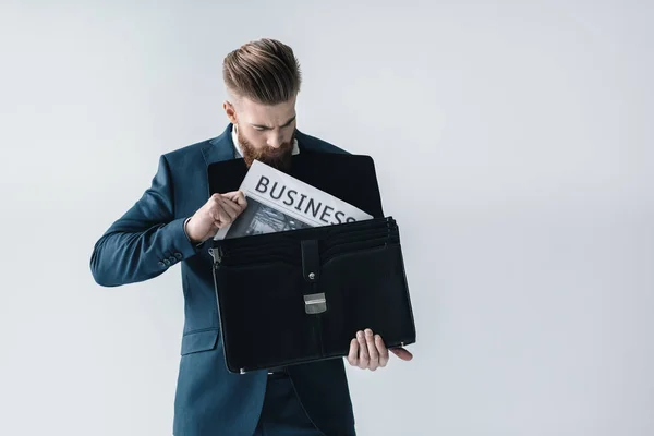 Handsome businessman with briefcase — Stock Photo