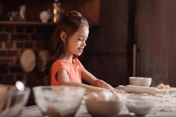 Girl with flour on face — Stock Photo