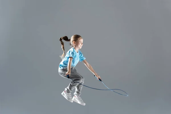 Girl with skipping rope — Stock Photo