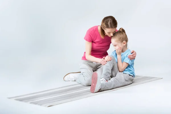 Mother appeasing daughter — Stock Photo