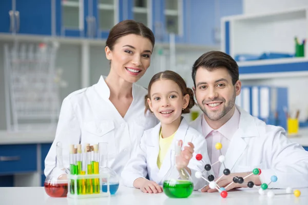 Teachers scientists and student — Stock Photo