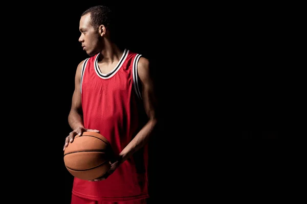 Jugador de baloncesto con pelota - foto de stock