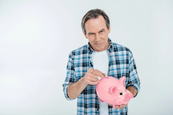 Man holding piggy bank — Stock Photo