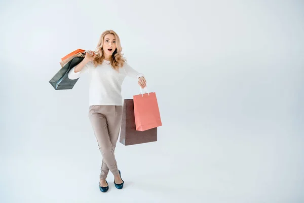 Mujer con bolsas de compras - foto de stock
