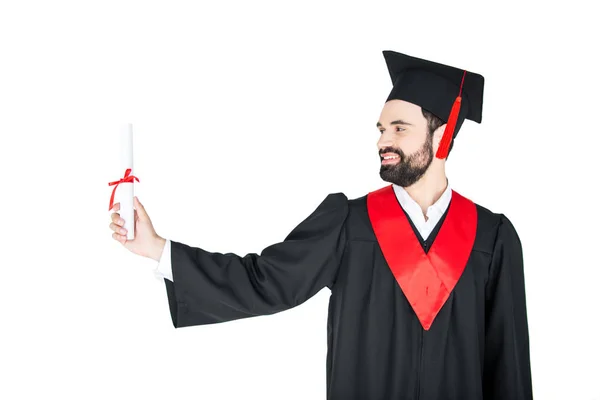 Student holding diploma — Stock Photo