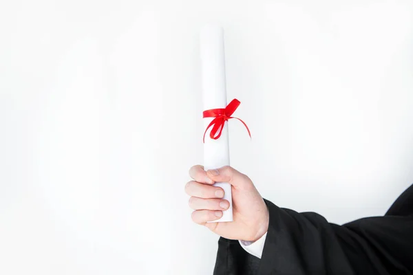 Student holding diploma — Stock Photo