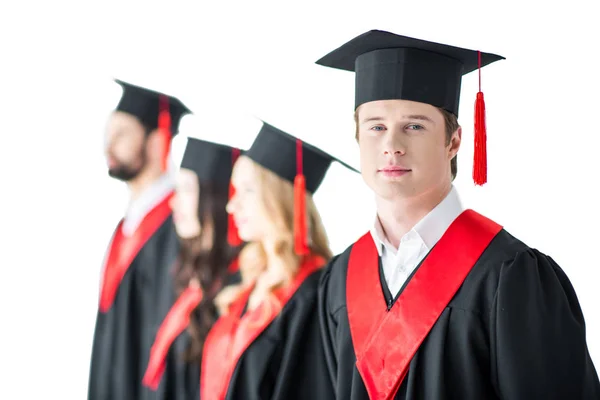 Student in graduation cap with diploma — Stock Photo